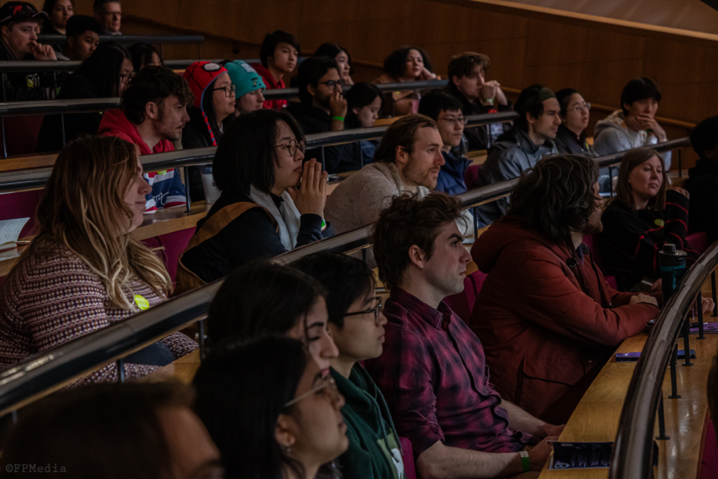 Attendees listening to a talk. Credits: Tanya Kapur