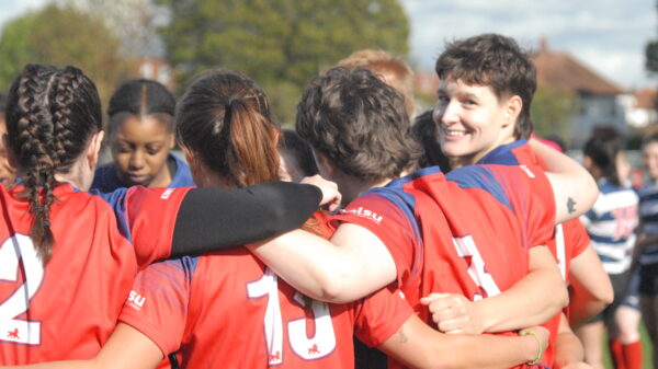 KCL Women's Rugby having a team talk during a BUCS fixture