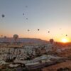 Hot air baloons floating over Cappadocia.