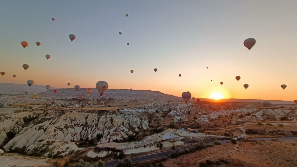 Hot air baloons floating over Cappadocia.