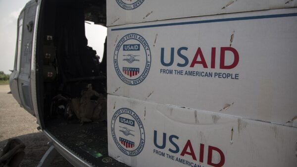 A U.S. Marine Corps UH-1Y Venom with Joint Task Force 505 is loaded with relief supplies from the United States Agency for International Development at Tribhuvan International Airport, Kathmandu.